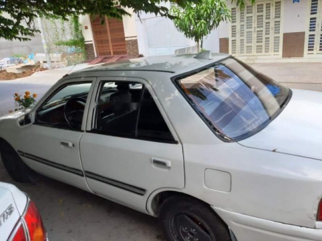 Bán Mazda 323 1995, màu trắng, nhập khẩu0