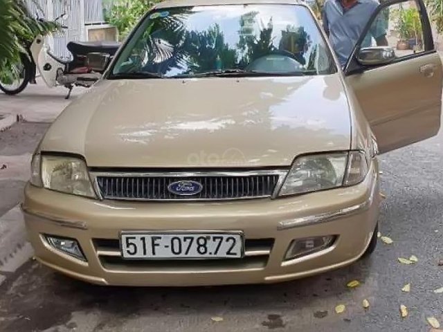 Bán xe Ford Laser Deluxe 1.6 MT đời 2002, màu vàng cát, 260 triệu