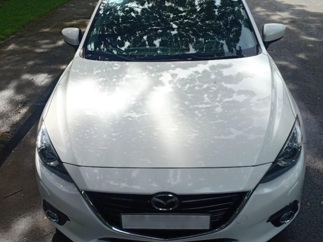 Bán ô tô Mazda 3 2.0AT sản xuất năm 2017, màu trắng sử dụng ít, cần bán lại 620 triệu