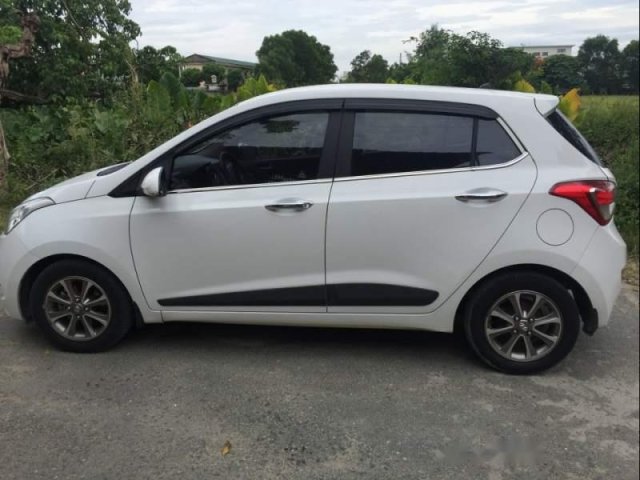 Bán Hyundai Grand i10 đời 2015, màu trắng, xe nhập như mới0