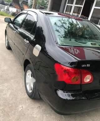 Cần bán Toyota Corolla altis đời 2003, màu đen đẹp như mới giá cạnh tranh