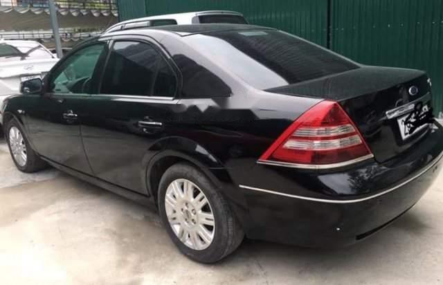 Bán lại xe Ford Mondeo 2.5 đời 2003, màu đen như mới