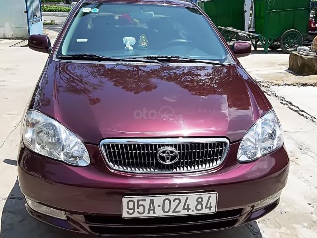 Xe Toyota Corolla altis năm 2002, màu đỏ số sàn