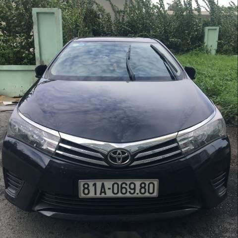 Bán Toyota Corolla altis 1.8MT 2014, màu đen, chính chủ0