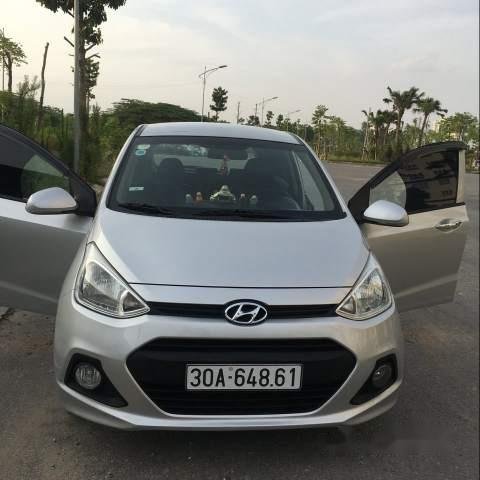 Cần bán Hyundai Grand i10 sản xuất năm 2015, màu bạc, xe nhập xe gia đình0