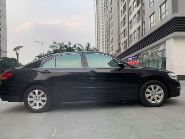 Cần bán xe Toyota Camry 2.4 năm sản xuất 2009, màu đen chính chủ, 525 triệu