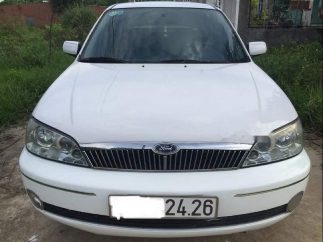 Bán xe Ford Laser Ghia 1.8 năm 2002, màu trắng, 168 triệu0