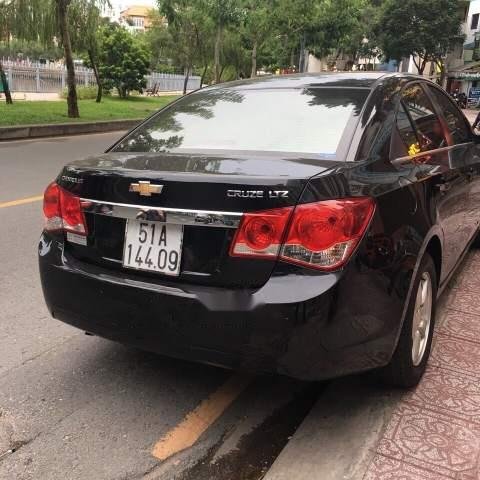 Cần bán xe Chevrolet Cruze đời 2011, màu đen0