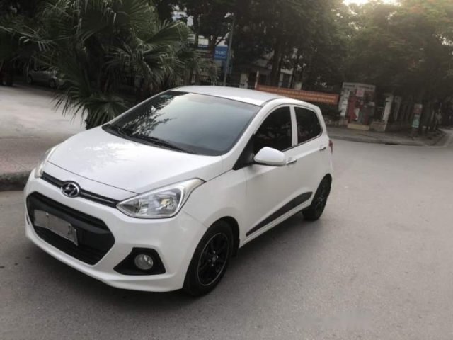 Bán ô tô Hyundai Grand i10 AT đời 2015, màu trắng, nhập khẩu, xe đẹp0