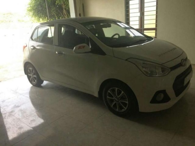 Cần bán lại xe Hyundai Grand i10 đời 2014, màu trắng, nhập khẩu nguyên chiếc còn mới0