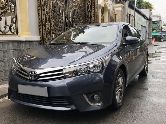 Bán Toyota Altis 2015 số sàn, màu xanh rất đẹp0