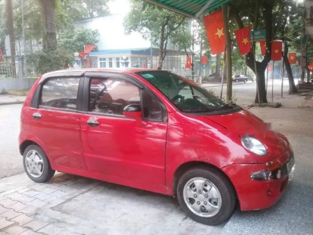 Cần bán lại xe Daewoo Matiz năm sản xuất 2001, màu đỏ, đang sử dụng tốt0