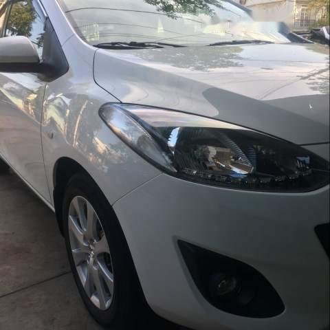 Bán ô tô Mazda 2 AT 2014, màu trắng, nhập khẩu nguyên chiếc, xe đẹp, máy móc bao test