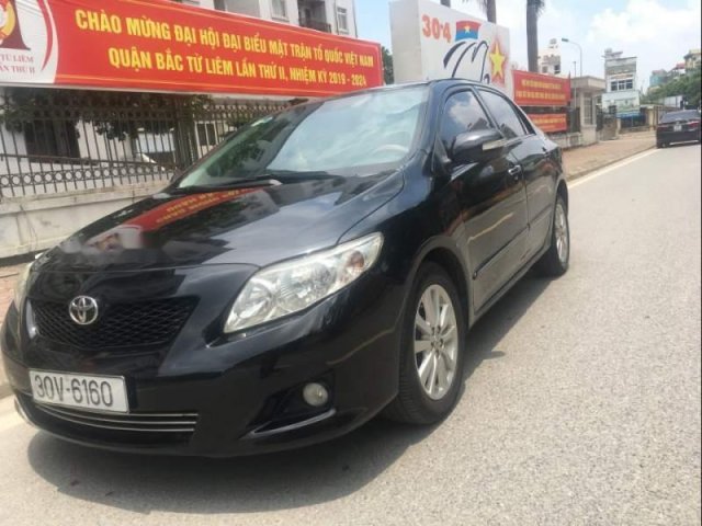 Bán xe Toyota Corolla Altis 2010, màu đen, mọi thứ còn gần như nguyên cả xe0