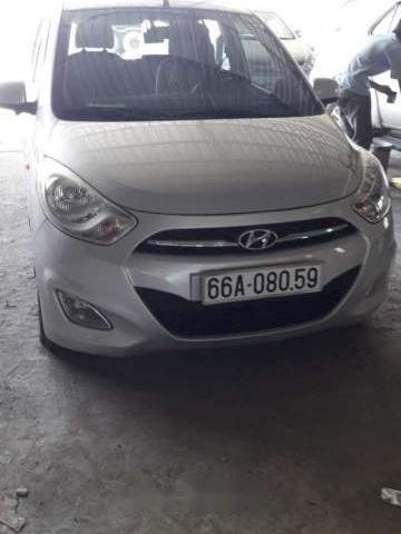 Cần bán gấp Hyundai Grand i10 sản xuất năm 2013, màu bạc, xe đẹp0