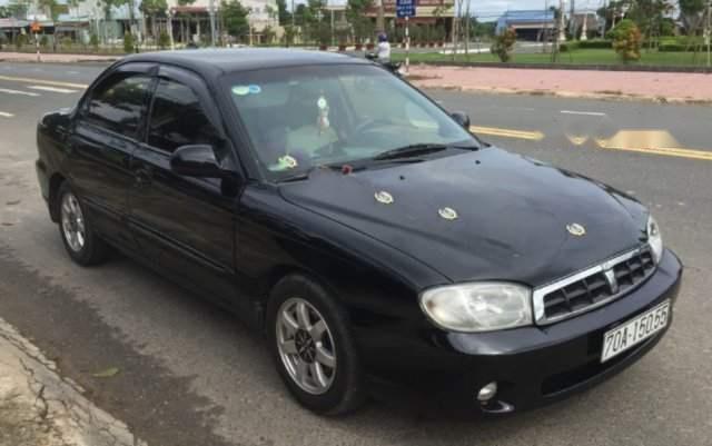 Bán Kia Spectra 1.6 MT đời 2004, màu đen, xe công chức đi làm nên còn đẹp