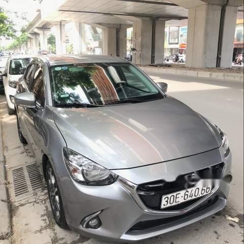 Bán xe Mazda 2 sản xuất 2015, màu xám, xe đi giữ gìn cẩn thận