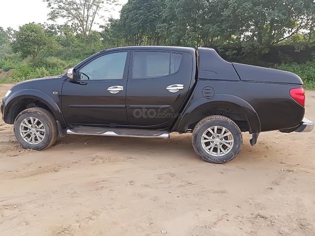 Cần bán lại xe Mitsubishi Triton GLS 4x4 MT năm 2014, màu đen 