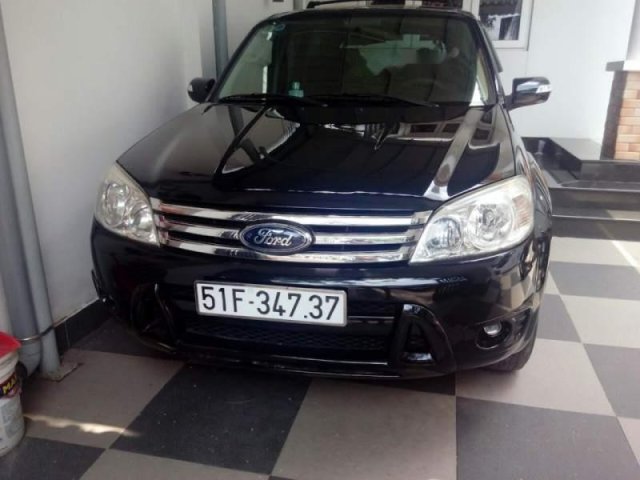 Bán chiếc xe Ford Escape 2.3 đời 2009, màu đen, số tự động, xe rất đẹp