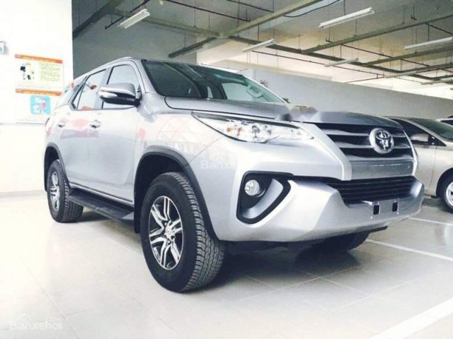 Cần bán lại xe Toyota Fortuner đời 2016, màu bạc, còn BH hãng