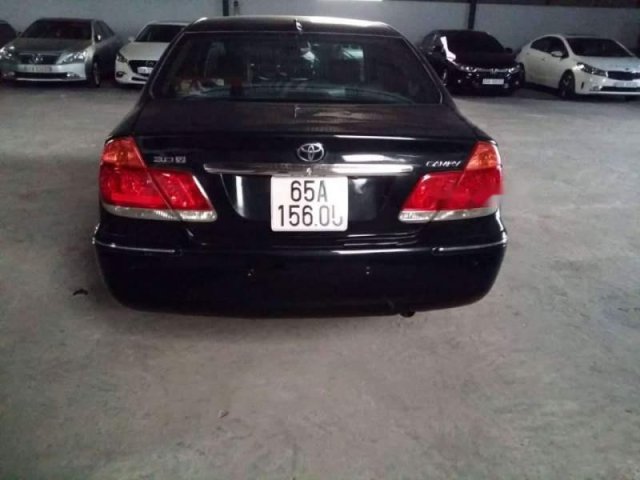 Cần bán lại xe Toyota Camry đời 2004, màu đen số tự động, giá 350tr0