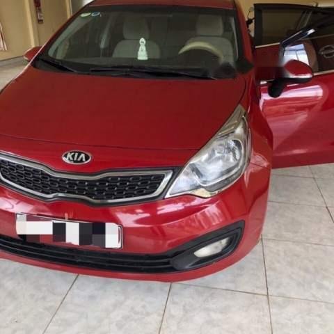 Cần bán gấp Kia Rio sản xuất 2014, màu đỏ, nhập khẩu nguyên chiếc xe gia đình