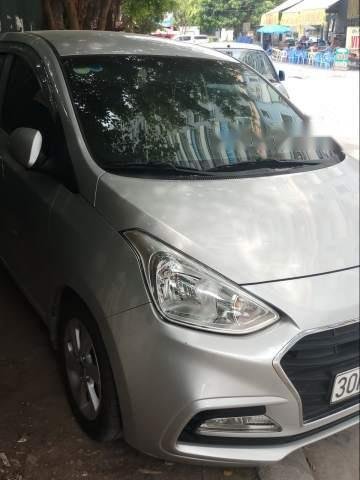 Bán ô tô Hyundai Grand i10 năm 2015, màu bạc chính chủ giá cạnh tranh0