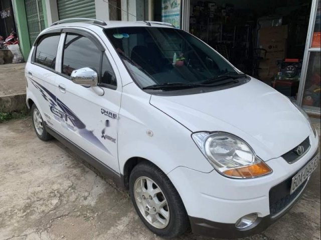 Bán gấp Daewoo Matiz đời 2009, màu trắng, số tự động0