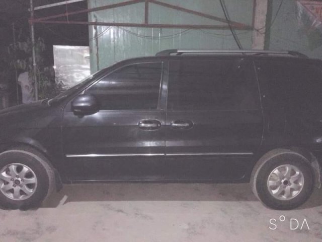 Bán ô tô Kia Carnival năm 2009, màu đen, xe nhập0