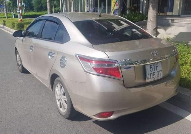 Cần bán gấp Toyota Vios sản xuất 2016, màu vàng, xe gia đình sử dụng