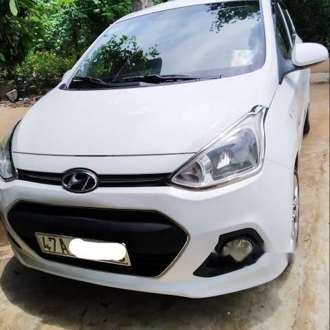 Bán Hyundai Grand i10 năm sản xuất 2014, màu trắng, nhập khẩu, xe còn khá mới chạy rất êm0