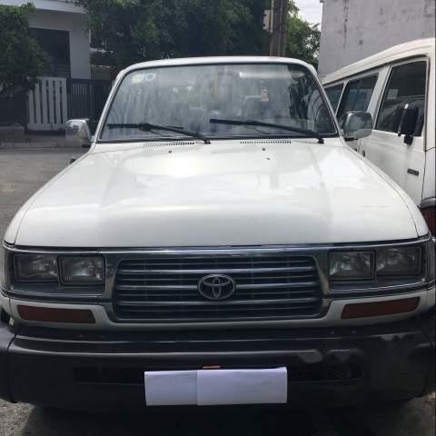 Bán Toyota Land Cruiser sản xuất 1996, màu trắng, nhập khẩu, 7 chỗ