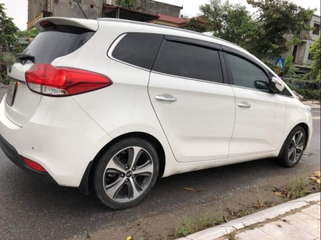 Bán xe Kia Rondo GAT đời 2015, màu trắng0