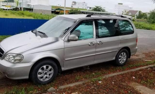 Chính chủ bán lại xe Kia Carnival V6 2.5 năm 2009, màu bạc0