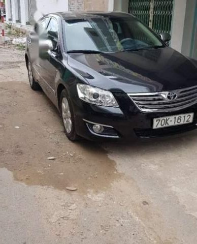 Cần bán lại xe Toyota Camry 2.4 G đời 2009, màu đen, nhập khẩu, còn rất mới0