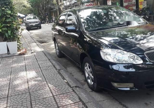 Bán ô tô Toyota Corolla altis 1.8MT sản xuất năm 2003, màu đen, chất lượng xe yên tâm