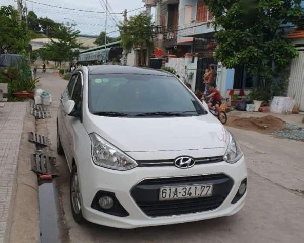 Bán Hyundai Grand i10 MT năm sản xuất 2017, màu trắng, nhập khẩu, xe gia đinh đi bao rin0