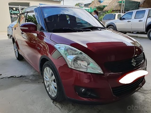 Cần bán Suzuki Swift AT đời 2015, màu đỏ chính chủ giá cạnh tranh0