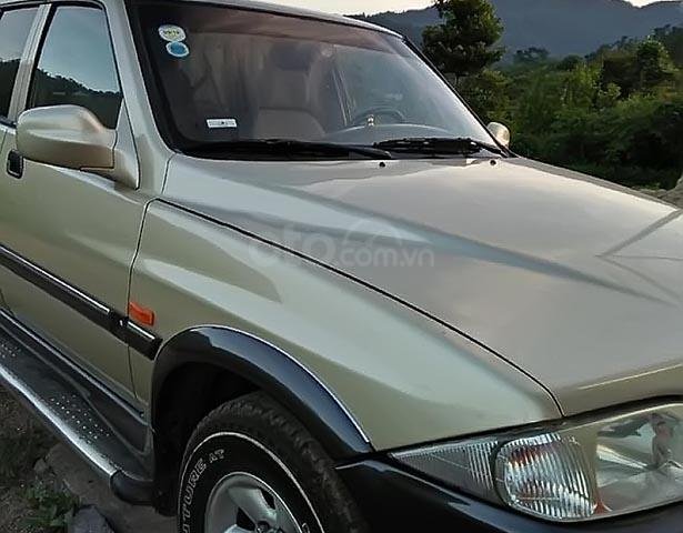 Xe Ssangyong Musso 2.3 năm sản xuất 2003, màu vàng, giá tốt0