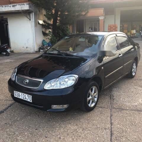 Bán xe Toyota Corolla altis MT đời 2003, màu đen, xe nhập, xe gia đình sử dụng