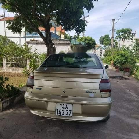 Cần bán gấp Fiat Siena sản xuất năm 2003, màu vàng0