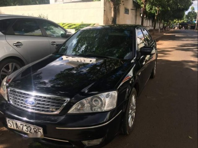 Bán xe Ford Mondeo đời 2004, màu đen, hạng D với đầy đủ các tính năng hiện đại0