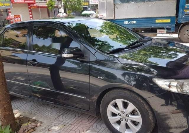 Cần bán xe Toyota Corolla Altis đời 2009, màu đen, xe đẹp0