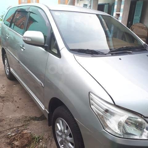 Bán ô tô Toyota Innova đời 2012, màu bạc0