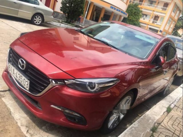 Bán Mazda 3 AT năm 2017, màu đỏ, có trầy xước và dặm nhẹ lại rồi