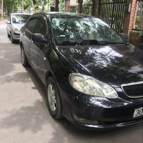 Cần bán lại xe Toyota Corolla altis 2003, màu đen, xe đẹp0