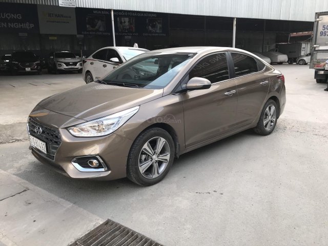 Bán Hyundai Accent 1.4AT màu nâu titan, bản đủ cao cấp sản xuất 2018 biển Sài Gòn 99%