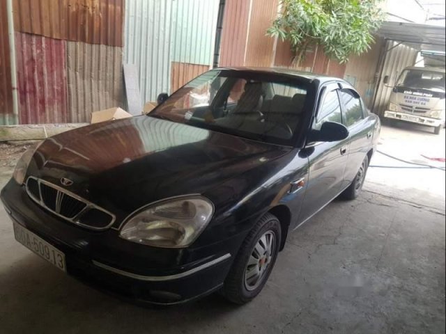 Bán Daewoo Nubira năm 2002, màu đen xe gia đình0