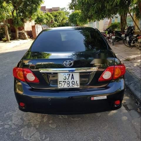 Cần bán lại xe Toyota Corolla altis G đời 2010, màu đen