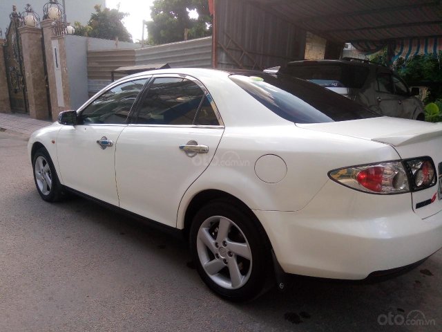 Cần bán lại xe Mazda 6 2.0 MT sản xuất năm 2004, màu trắng  0